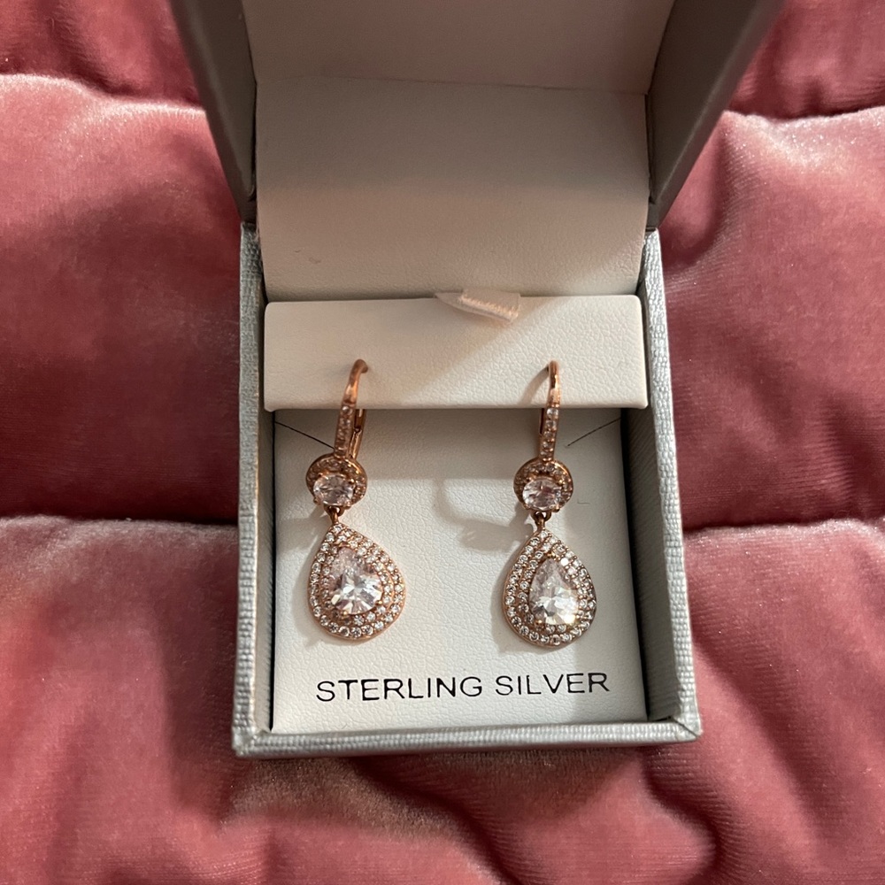 Sterling silver tear drop earrings, worn once. Comes in original box.
